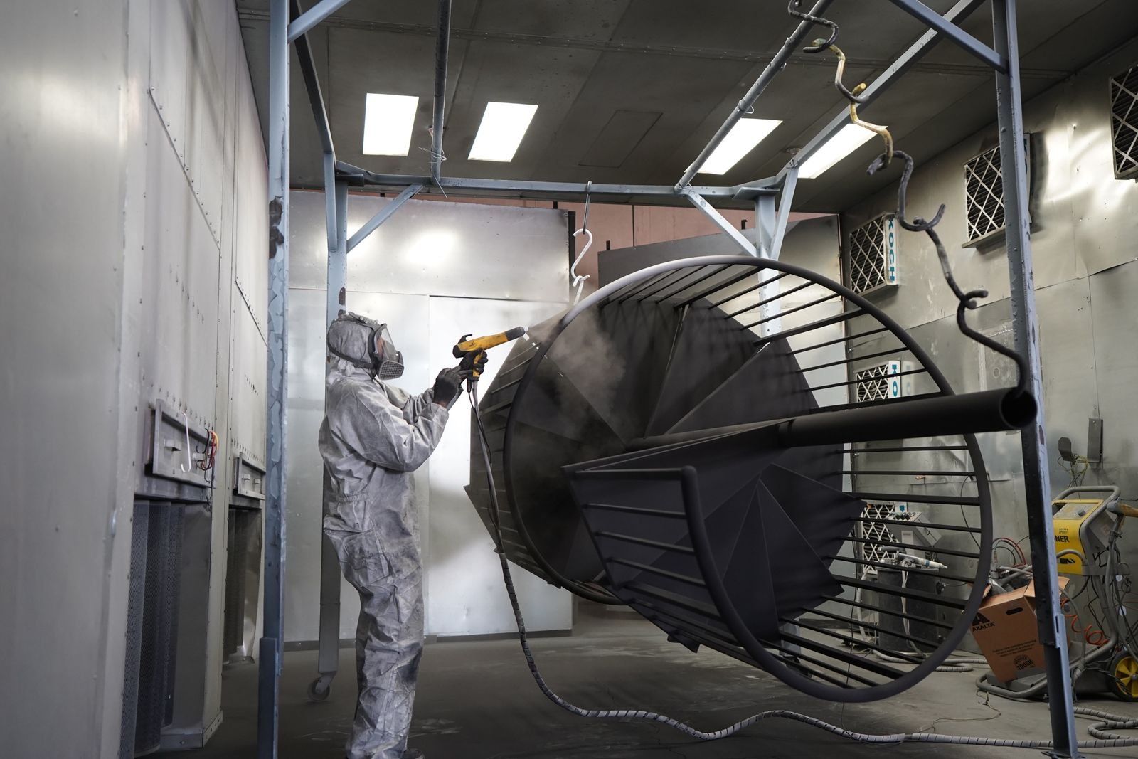 Applying protective coating to a steel structure